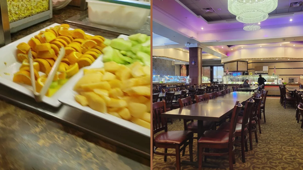Seafood buffet spread with varied hot dishes.