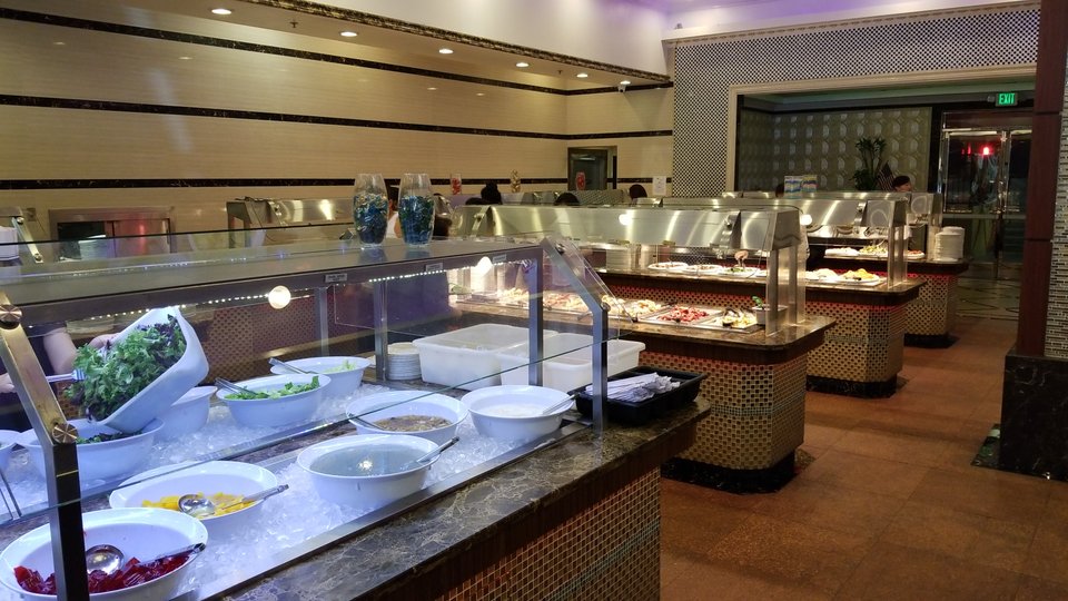 Rows of dishes in a casual restaurant setting.