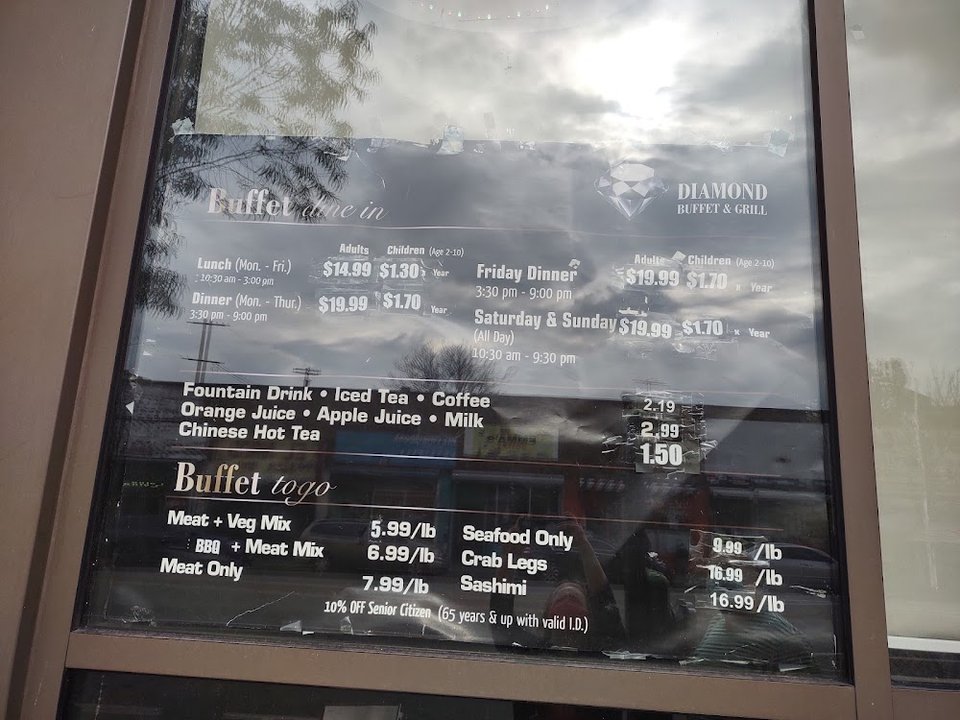 Assorted buffet dishes arranged for self-service.